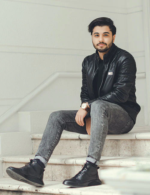Pair Black T-Shirt with a leather jacket and boots