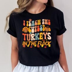 I Teach The Cutest Turkeys Groovy Thanksgiving Teacher T-Shirt