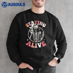 Retro Groovy Skeleton Staying Alive Coffee Halloween Hippie Sweatshirt